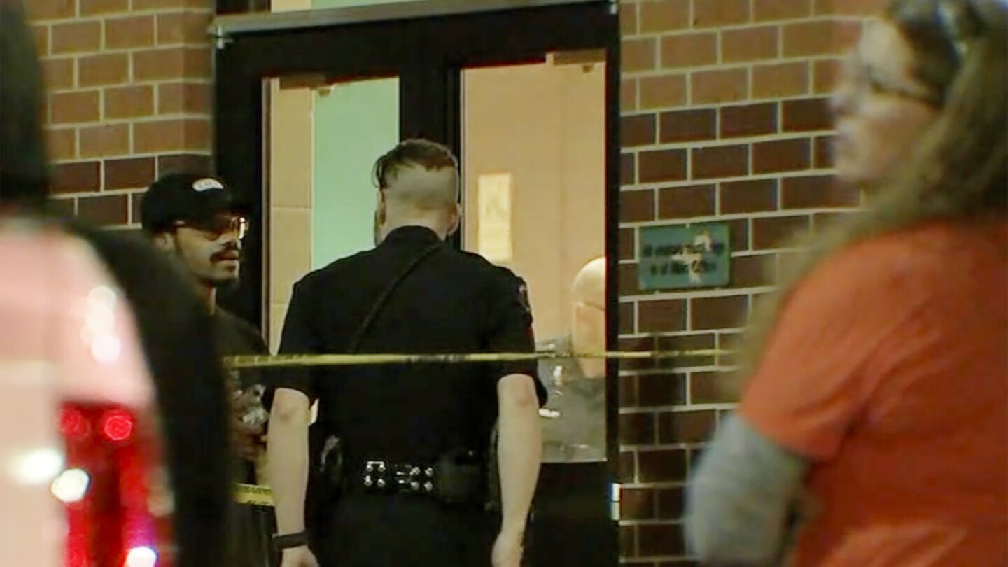 Authorities say that the parents of the Texas School Band Competition are working on one injured gunman